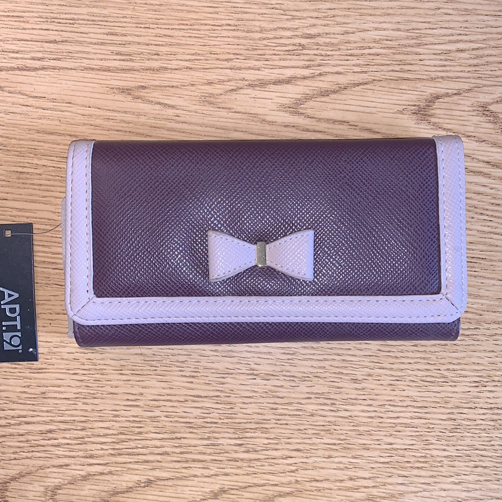 Brand new plum wallet with lavender bow detail  ▪️